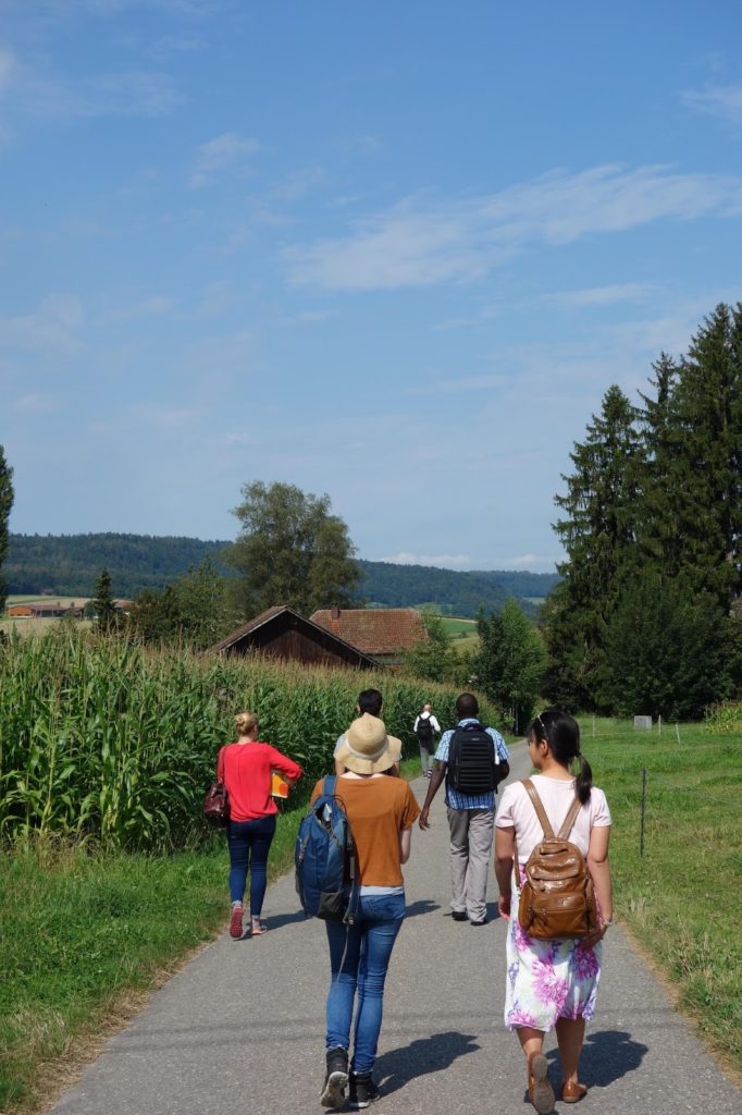 My classmates and I visiting an apple orchard in Bachs 