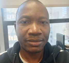 Walamatien Coulibaly working at Catholic Charities