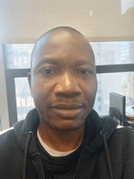 image Walamatien Coulibaly working at Catholic Charities